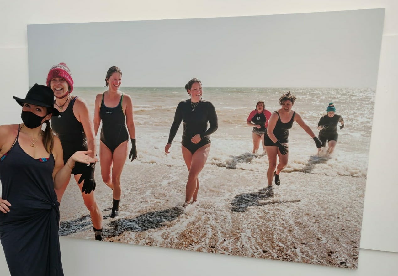 A group of sea swimmers coming out of the sea