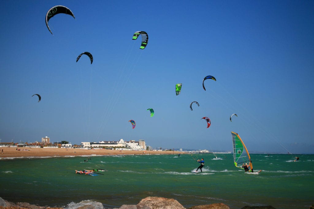 People kitesurfing